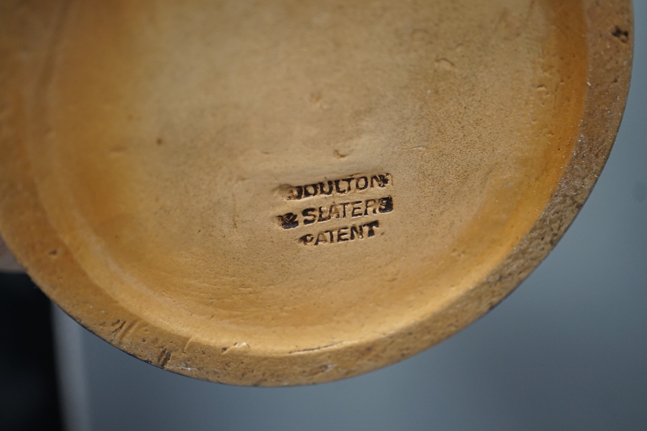 A Royal Doulton stoneware ‘UNC. BORIC.’ drug jar 18cm and a Doulton Slater’s patent flagon, 33cm